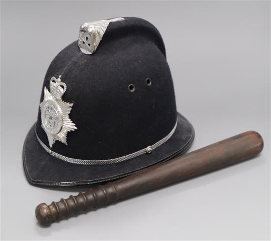A Northumbrian Police helmet and truncheon